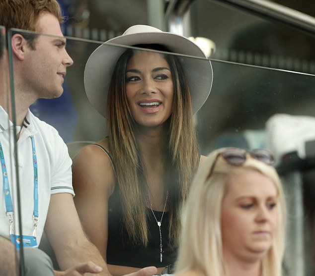 Pop star Nicole Scherzinger was spotted in the crowd watching her partner Grigor Dimitrov of Bulgaria during his match against France's Gilles Simon at the Brisbane International tennis tournament in Brisbane, 4 January 2015.